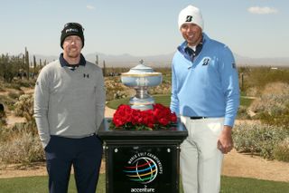 Mahan and Kuchar pose with the WGC Match Play trophy