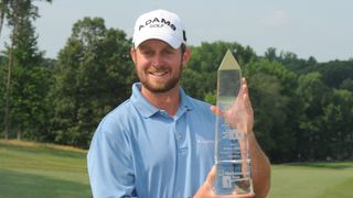 Steve Wheatcroft poses with the trophy after his win at the 2011 Melwood Prince George's County Open