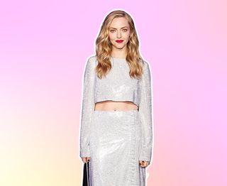 amanda seyfried in a silver dress on a pastel background