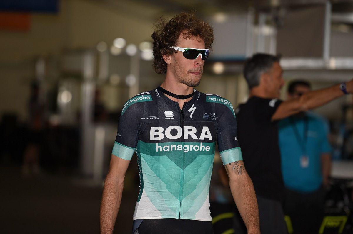 New Bora rider Daniel Oss walking to get his bike