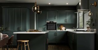 dark green kitchen with white countertops to show key kitchen trends 2023