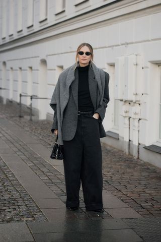 Photo of Scandi woman in winter street style during Copenhagen Fashion Week Fall-Winter 2025.