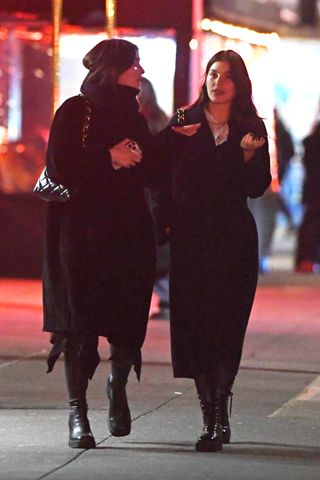 A photo of Gracie Abrams and Camila Morrone leaving dinner at Via Carota in New York City.