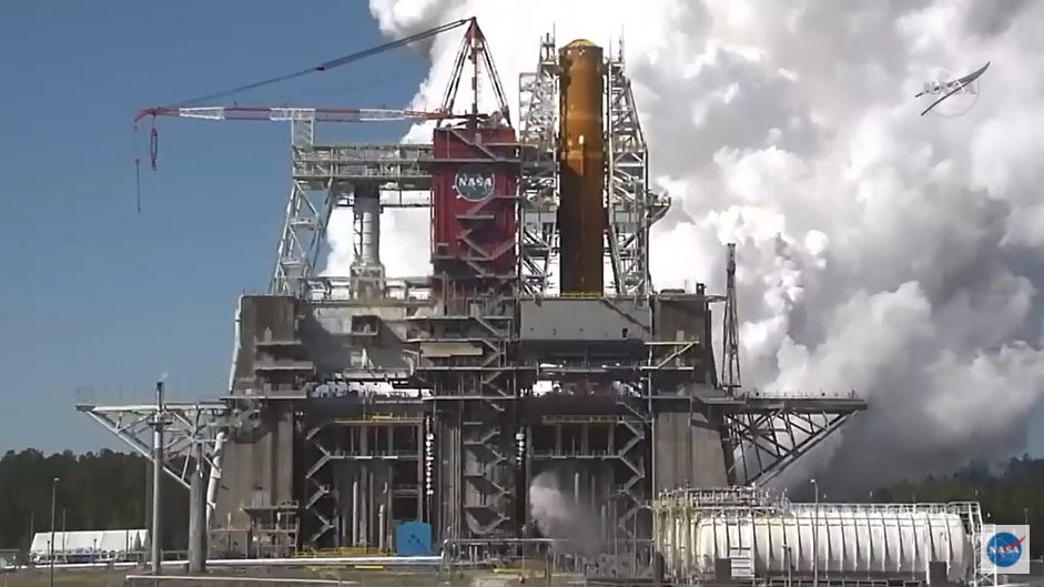 NASA's first Space Launch System megarocket test fires its four main RS-25 engines in a critical hot fire test at the Stennis Space Center near Bay St. Louis, Mississippi on March 18, 2021. The booster will launch NASA's Artemis 1 mission around the moon in late 2021.