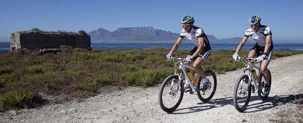 Team Bulls 1 consisting of Karl Platt (l) and Stefan Sahm (r) enjoy the opportunity to cycle on Robben Island. 100 VIP's went over to Robben Island with special permission to cycle around the island as a prelude to 2010 Cape Epic
