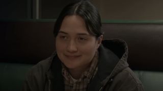 Jamie (Lily Gladstone) sits in a diner in Certain Women