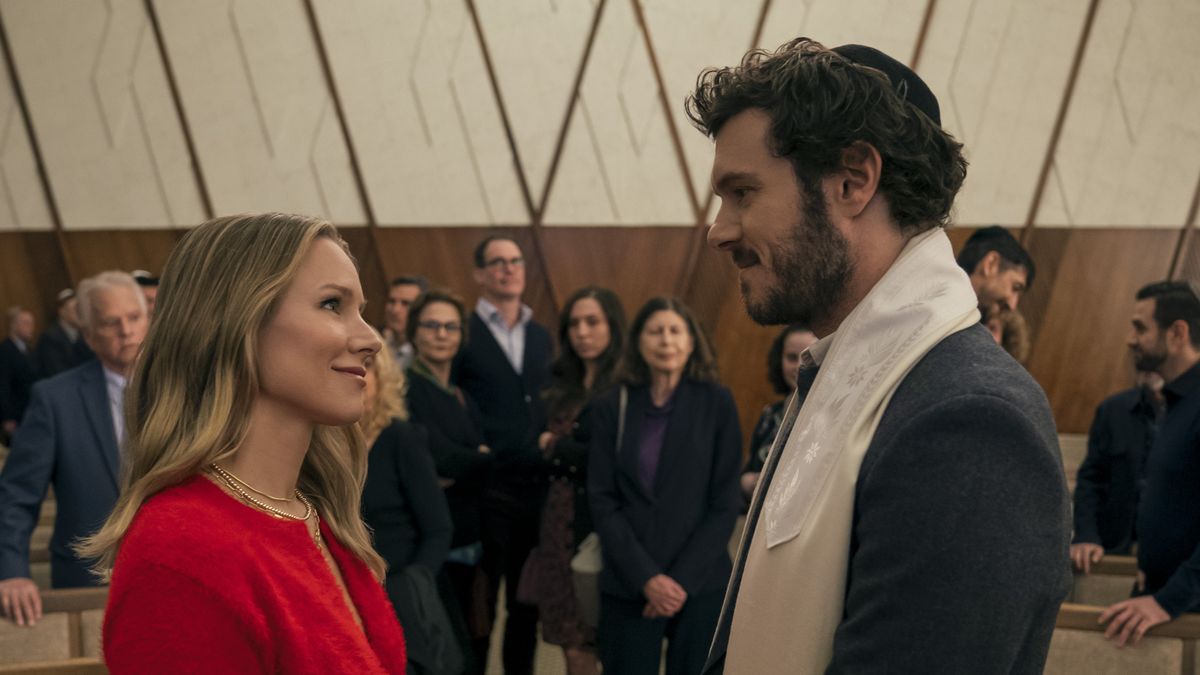 Kristen Bell as Joanne and Adam Brody as Noah staring at each other in Nobody Wants This