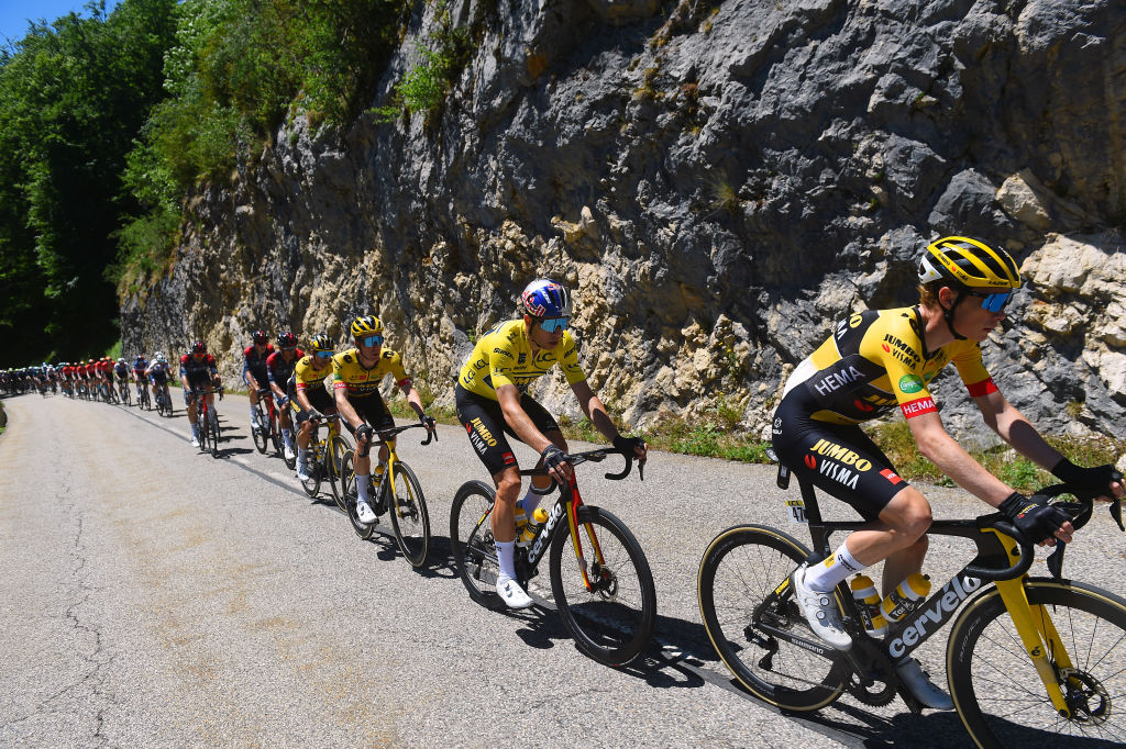 GAP FRANCE JUNE 10 LR Steven Kruijswijk of Netherlands Wout Van Aert of Belgium Yellow Leader Jersey and Jonas Vingegaard Rasmussen of Denmark and Team Jumbo Visma compete during the 74th Criterium du Dauphine 2022 Stage 6 a 1964km stage from Rives to Gap 742m WorldTour Dauphin on June 10 2022 in Gap France Photo by Dario BelingheriGetty Images