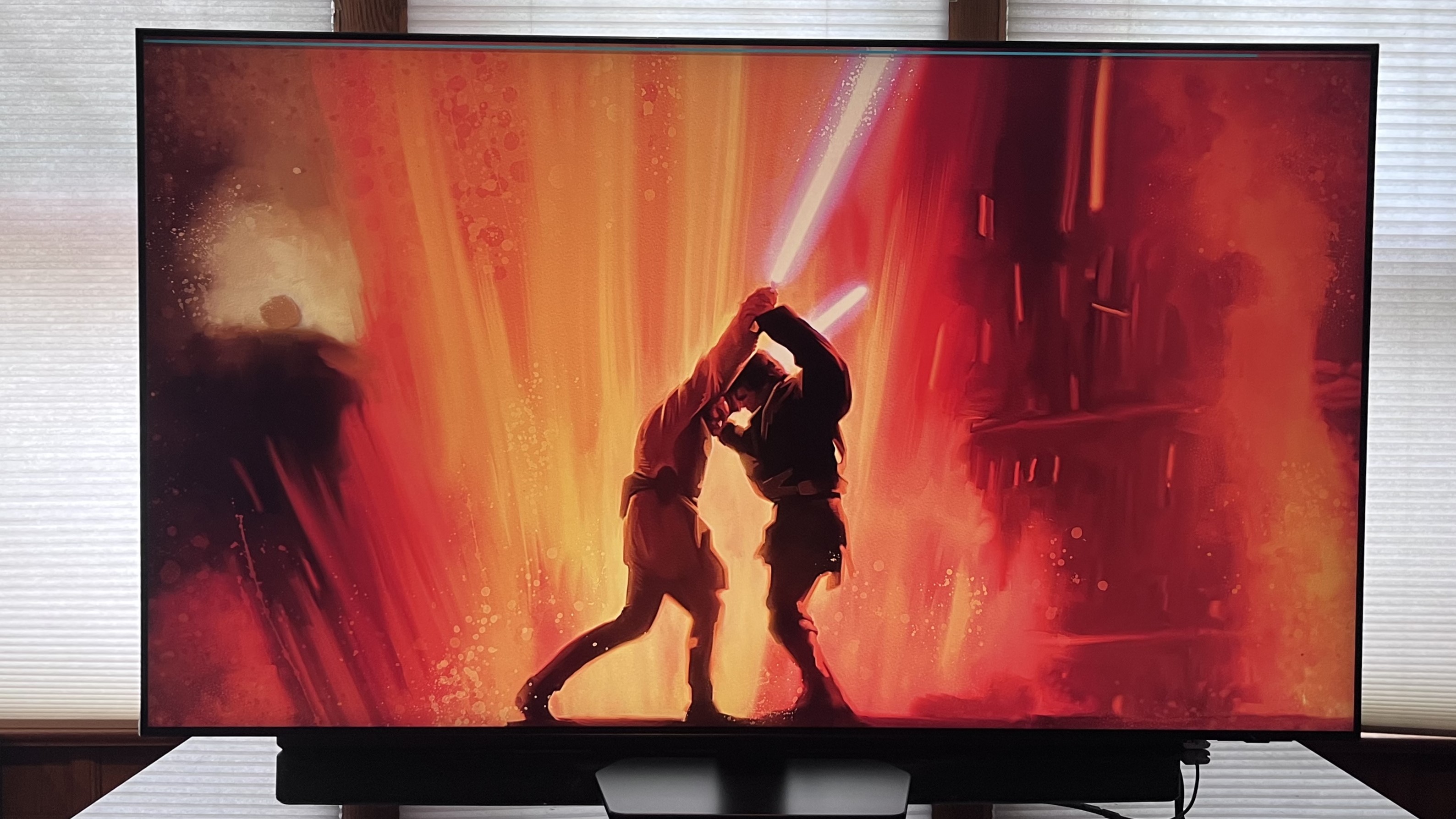 Samsung QN90F showing image of light saber battle from Star Wars