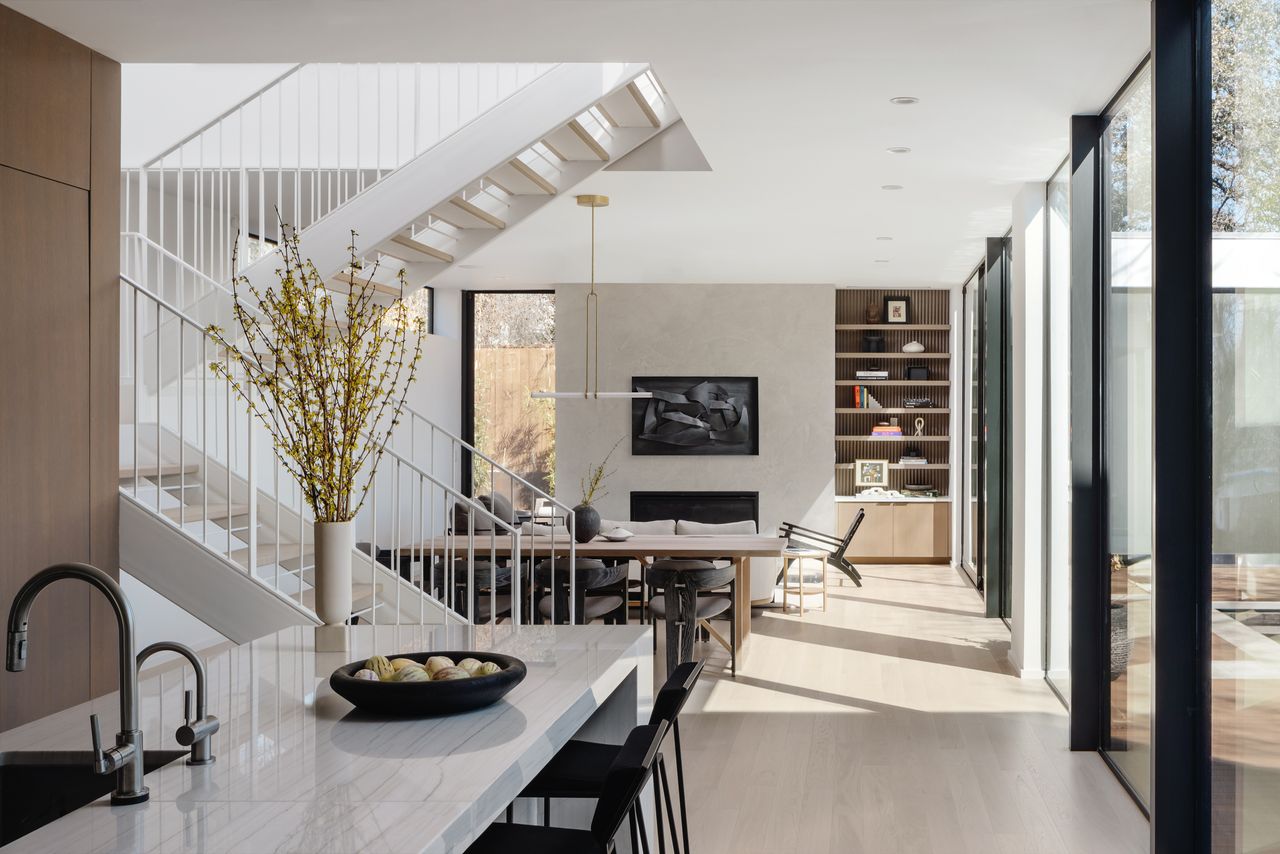 open plan dining and living room in neutral colors