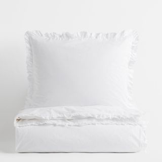 White bedding folded with pillow
