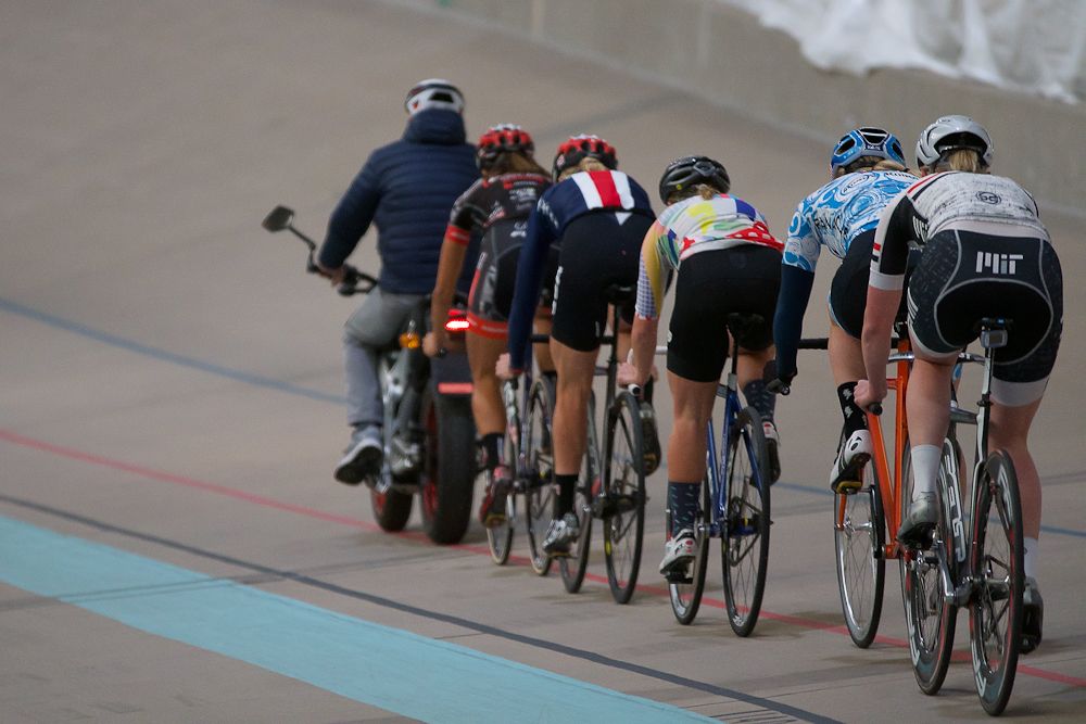 Riders follow Gary Sutton on the moto during the recent USA Cycling track talent ID camp