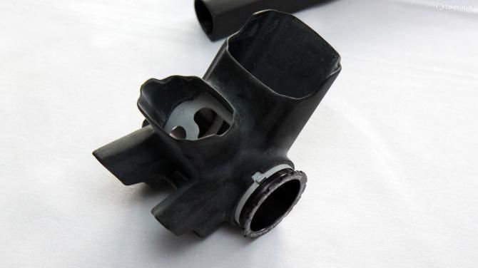 Colnago's ThreadFit 82.5 bottom bracket - here shown on a C60 shell - uses a permanently bonded-in aluminum threaded sleeve. PF86-compatible cups then thread in to provide what is supposed to be a creak-free fit