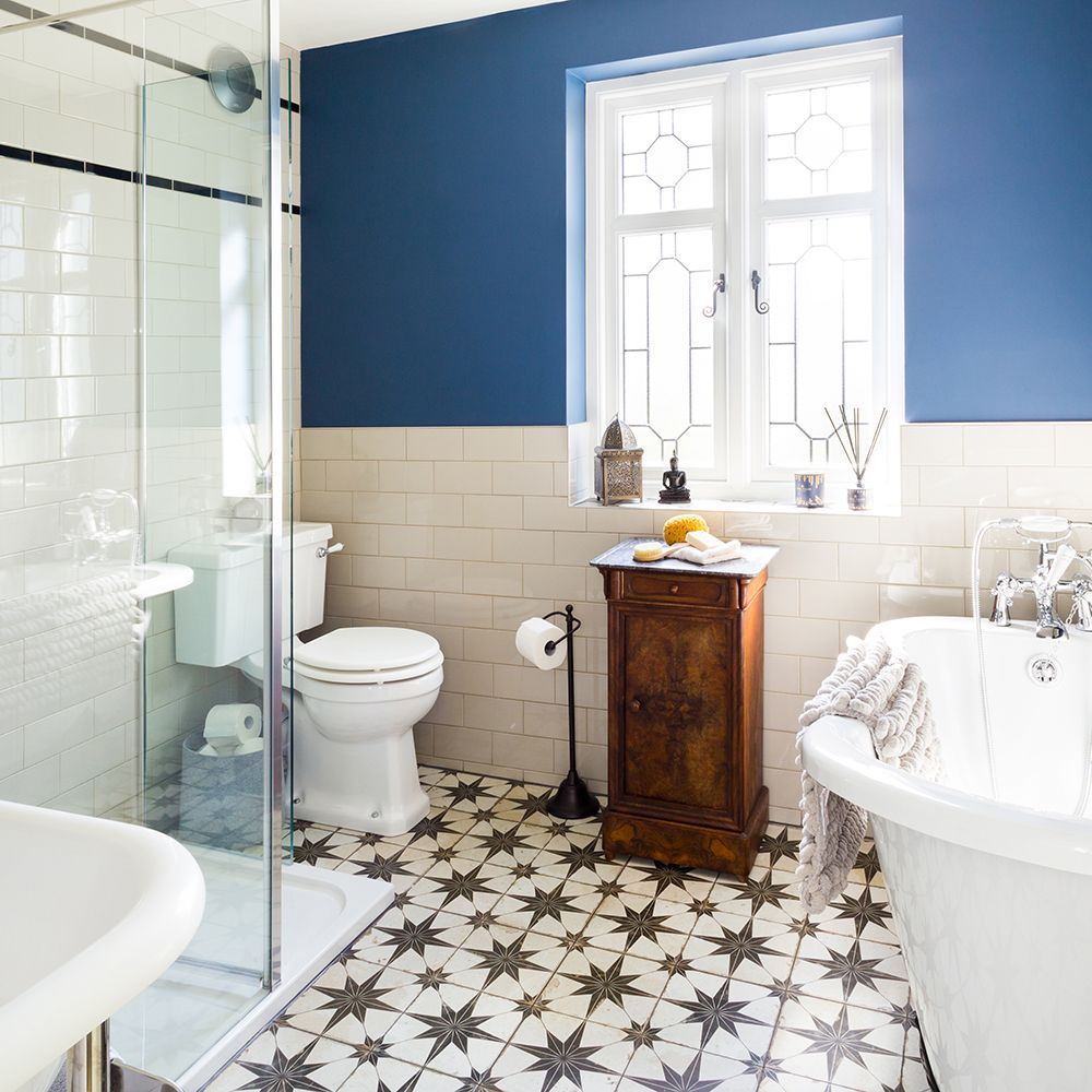 Traditional bathroom makeover with roll top bath, blue walls and star ...