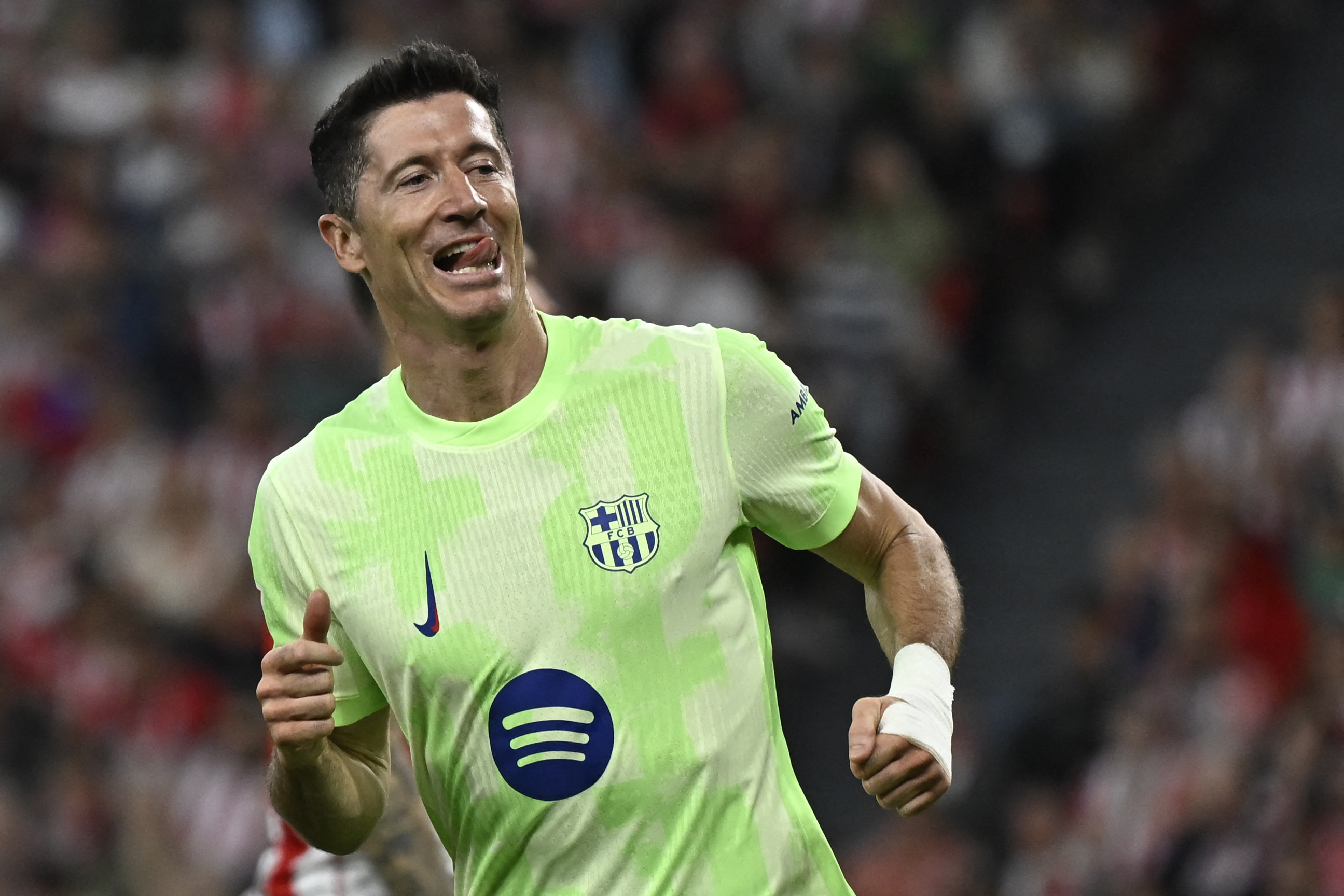 Robert Lewandowski celebrates after scoring his second goal for Barcelona against Athletic Club in La Liga in May 2025.