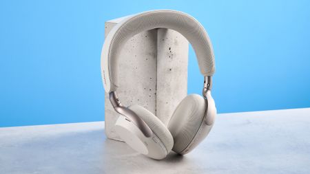 Jabras Evolve3 75 conferencing headset on a stone surface with a blue background