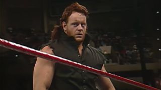 The Undertaker standing in the ring during his debut match at Survivor Series 1990