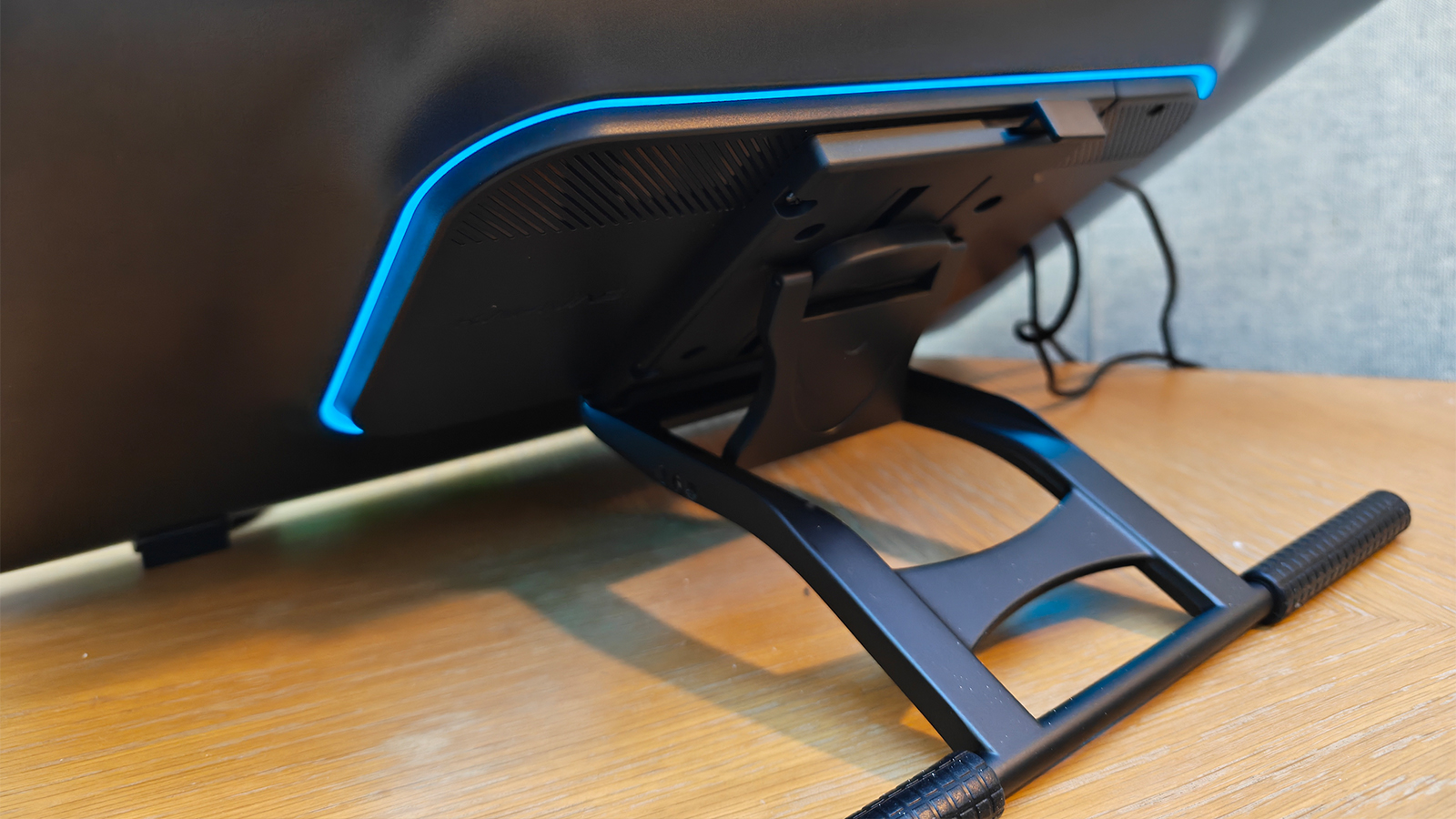 A black drawing tablet on a desk