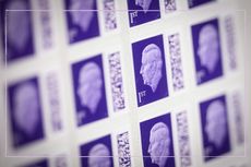 A close up of a sheet of First Class stamps