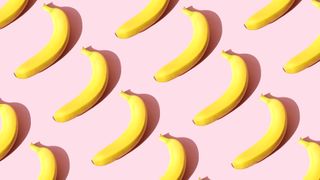 bananas repeated on pink background