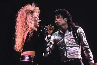 Sheryl Crow and Michael Jackson perform during the BAD Tour circa 1988