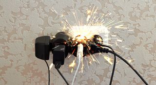 Overlaoded electric socket with sparks flying out