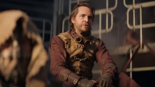 Aaron Stanford sits fired up in Deadpool & Wolverine.