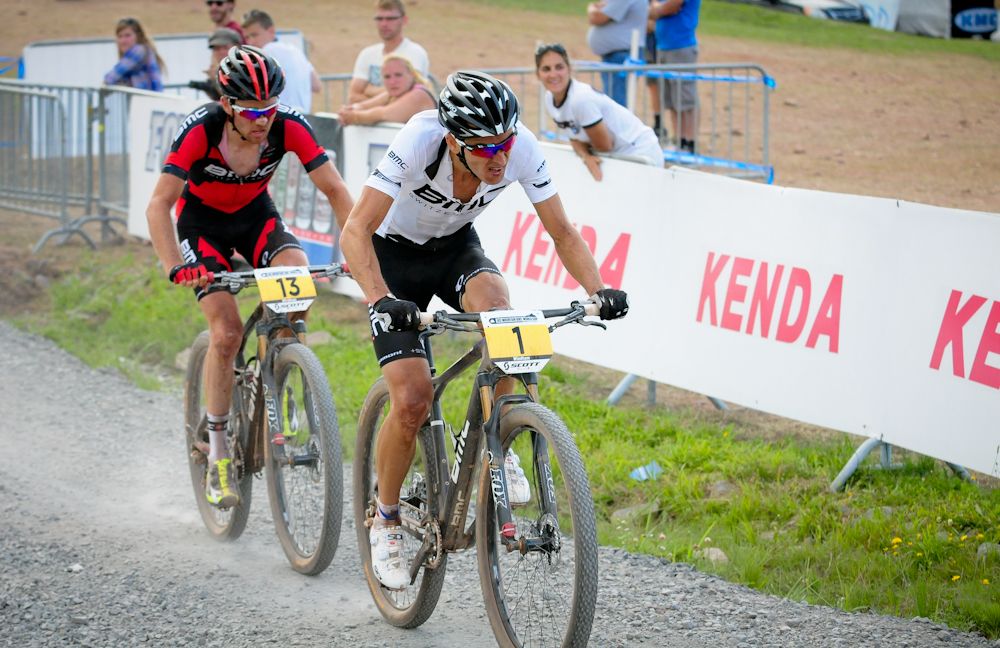 Julien Absalon (BMC Mountainbike) leading Lukas Fl&uuml;ckiger (BMC Mountain Bike) in the closing laps of the 2014 race