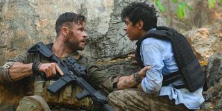 Chris Hemsworth and Rudhraksh Jaiswal in Extraction