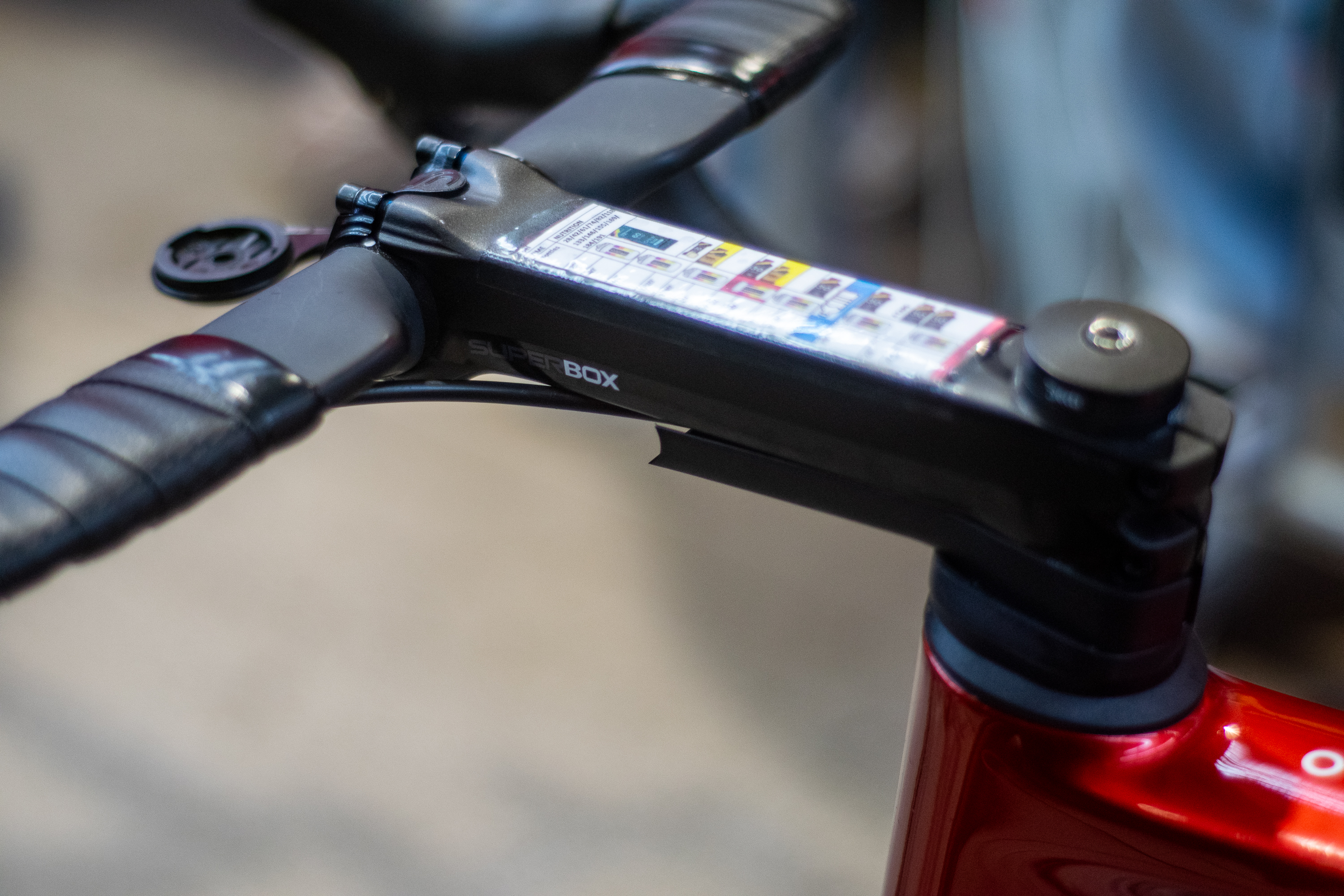 Closeup of notes on the stem of a Lotto rider