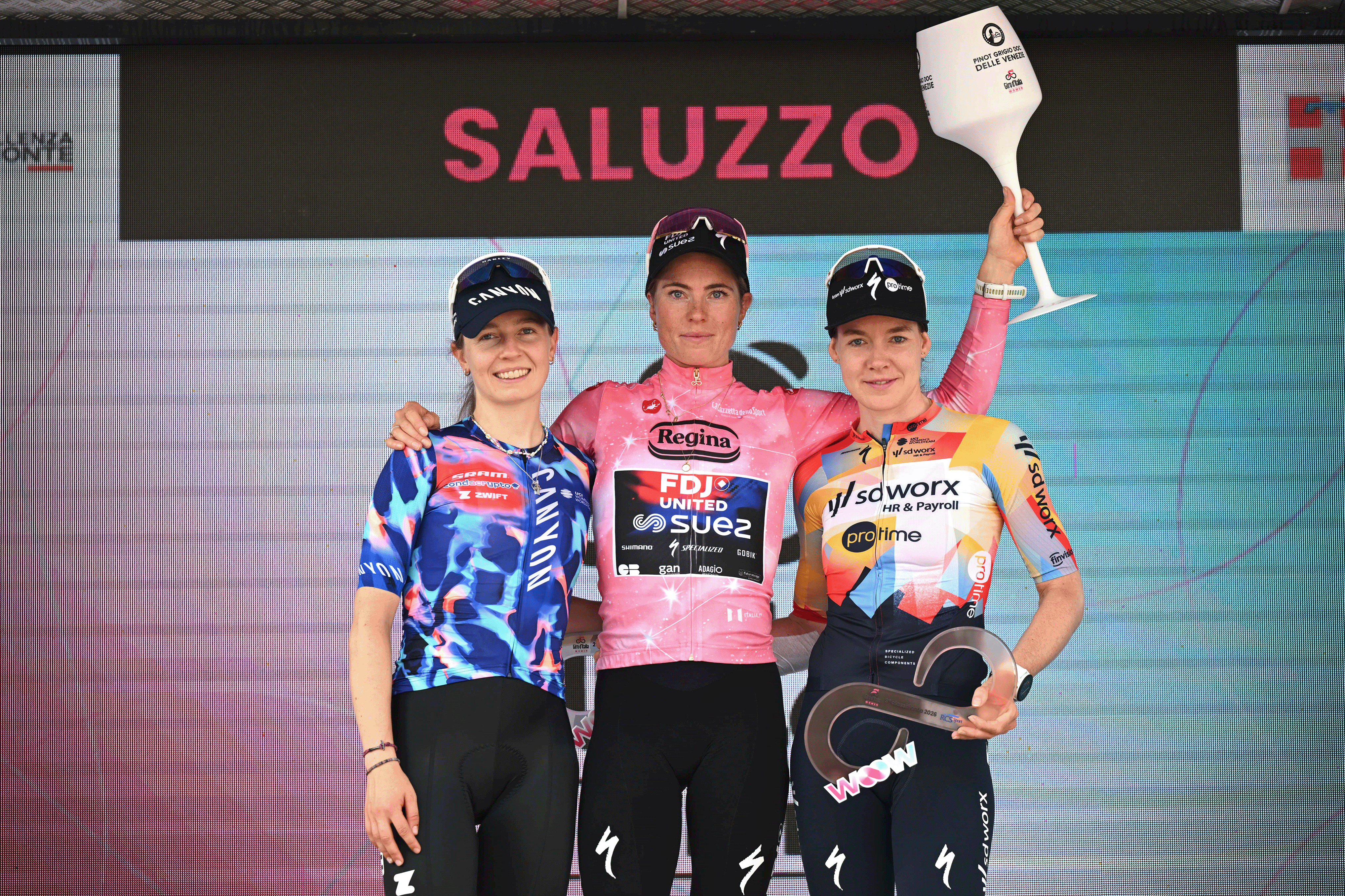 SALUZZO, ITALY - JUNE 07: (L-R) Antonia Niedermaier of Germany and Team CANYON//SRAM zondacrypto on second place, race winner Demi Vollering of Netherlands and Team FDJ United - SUEZ - Pink Leader Jersey and Anna van der Breggen of Netherlands and Team SD Worx - Protime on third place pose on the podium ceremony after the 37th Giro d'Italia Women 2026 - Stage 9 a 145km stage from Saluzzo to Saluzzo / #UCIWWT / on June 07, 2026 in Saluzzo, Italy. (Photo by Luc Claessen/Getty Images)