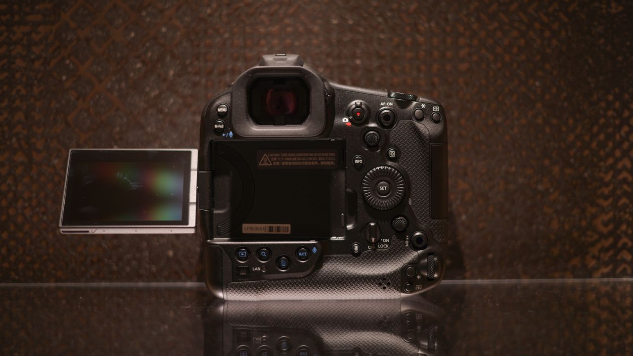 Canon EOS R1 against a dark background