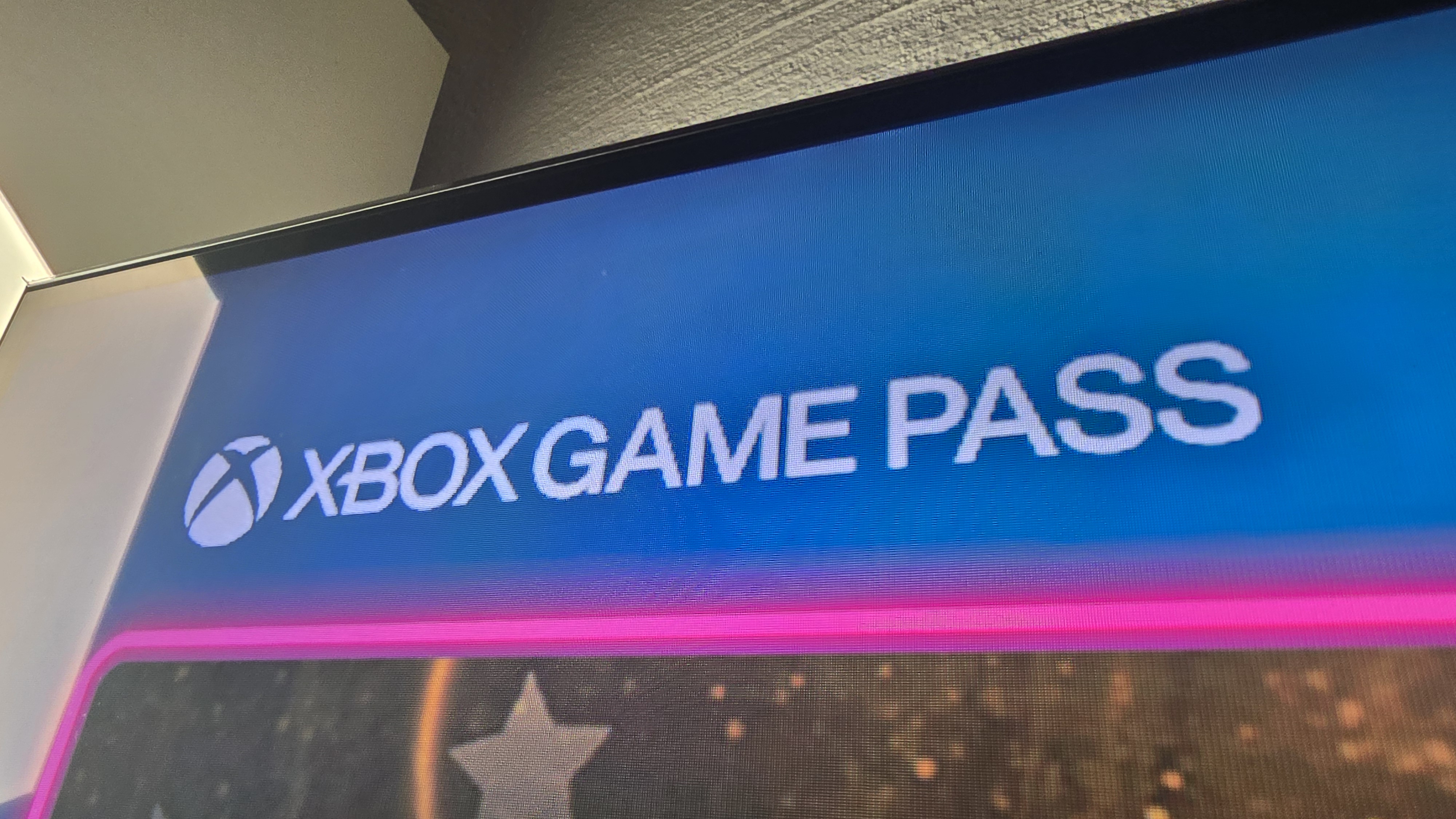 Xbox Game Pass logo on a TV