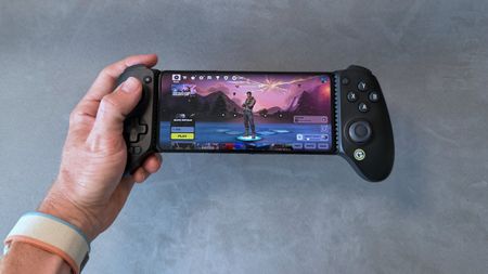 A black model of the GameSir G8 Plus Bluetooth mobile controller on a clean grey surface.