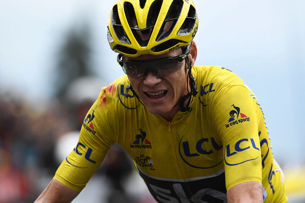 Chris Froome (Team Sky) crosses the line after a hectic stage 19