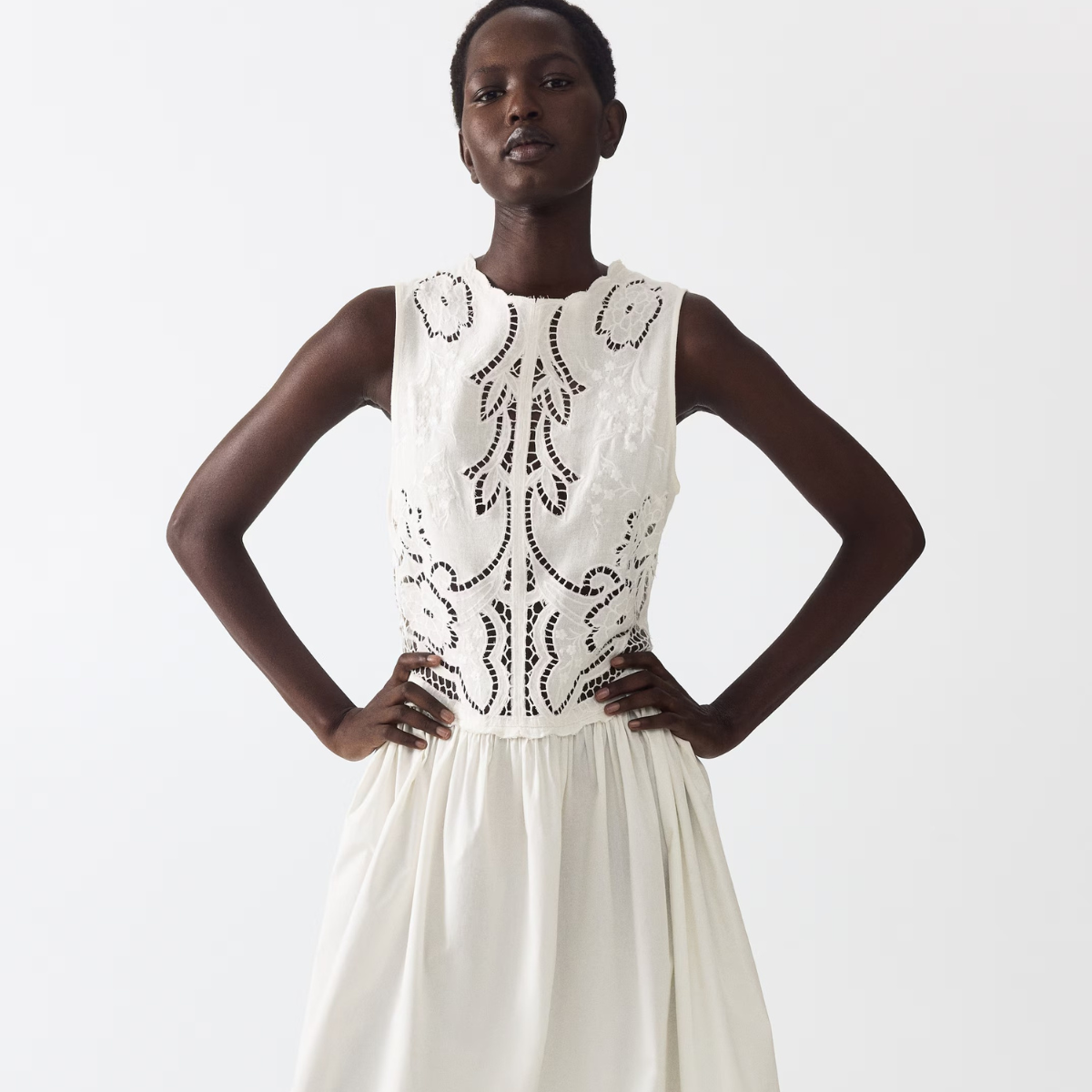 This Expensive-Looking H&M Dress Is About to be Everywhere, model shot of the H&M Embroidered Linen-blend Dress 
