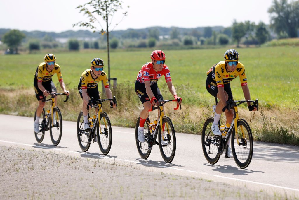 BREDA NETHERLANDS AUGUST 21 LR Chris Harper of Australia Sam Oomen of Netherlands Mike Teunissen of Netherlands Red Leader Jersey and Edoardo Affini of Italy and Team Jumbo Visma compete during the 77th Tour of Spain 2022 Stage 3 a 1932km stage from Breda to Breda LaVuelta22 WorldTour on August 21 2022 in Breda Netherlands Photo by Bas CzerwinskiGetty Images