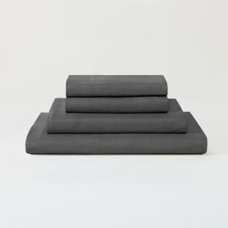 Sijo Eucalyptus Sheet Set in gray against an off-white background. 