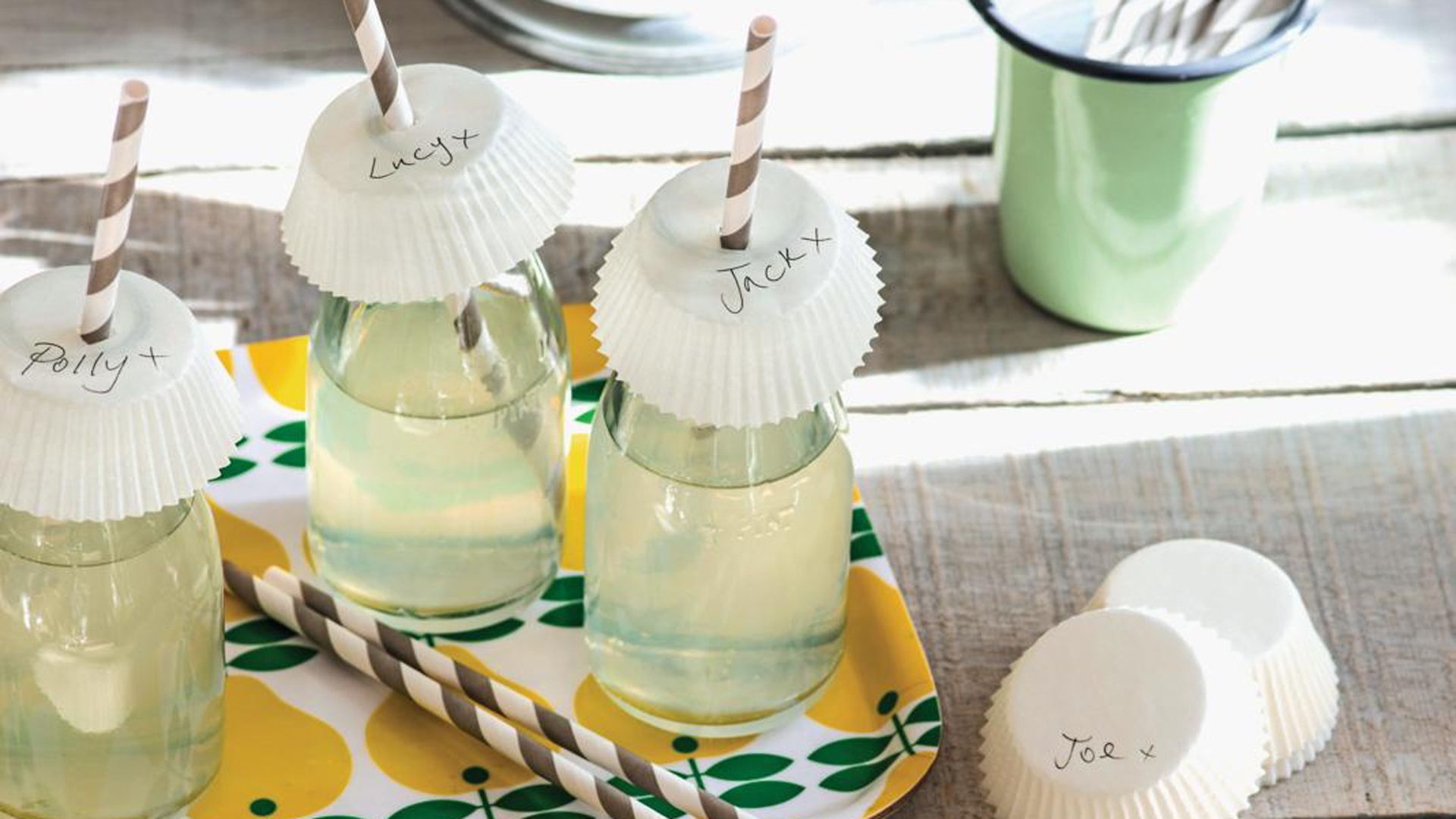Outdoor drinks with DIY cupcake lids to keep wasps away
