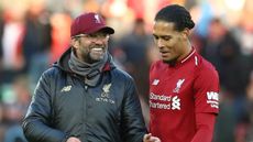 Liverpool’s German manager Jurgen Klopp and Dutch defender Virgil van Dijk