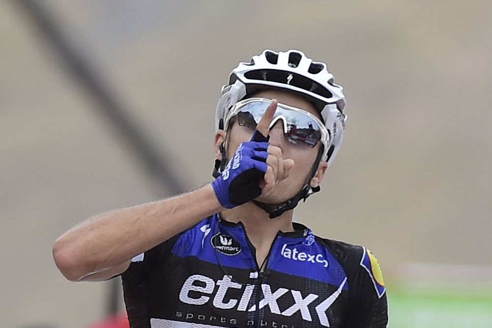 Gianluca Brambilla (Etixx-QuickStep) wins stage 15 and points to the sky