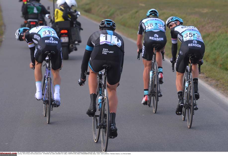 Tom Boonen and Niki Terpstra look behind them to see Ian Stannard has infiltrated their group at Omloop Het Nieuwsblad