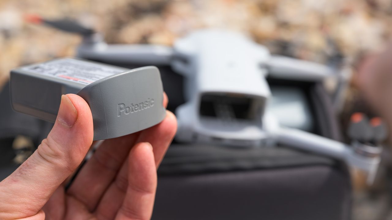 Close up of the Potensic Atom 3 beginner drone's battery before it's inserted in the drone