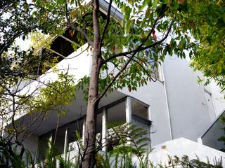 strathmore apartments and the modernist interior of white apartment building