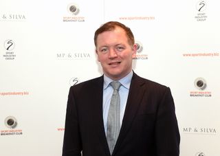 Damian Collins MP poses for photographs during the Sport Industry Breakfast Club on March 10, 2016 in London