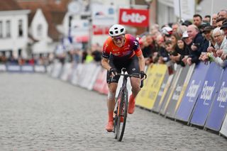 NOKERE BELGIUM MARCH 13 Lily Williams of The United States and Team Human Powered Health crosses the finish line during the 5th Danilith Nokere Koerse 2024 Womens Elite a 127km one day race from Deinze to Nokere UCIWWT on March 13 2024 in Nokere Belgium Photo by Luc ClaessenGetty Images