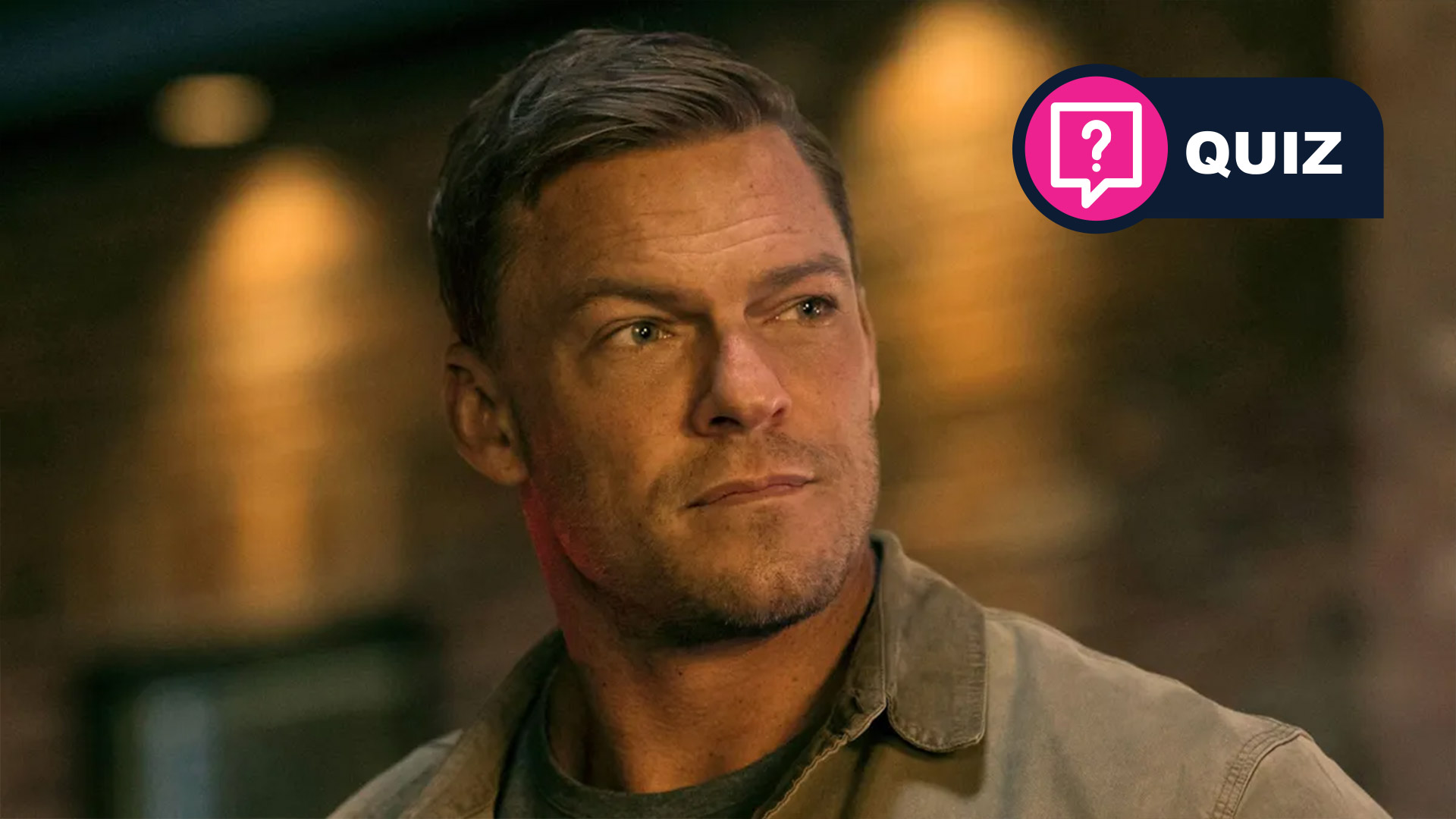 Reacher looks at something offscreen