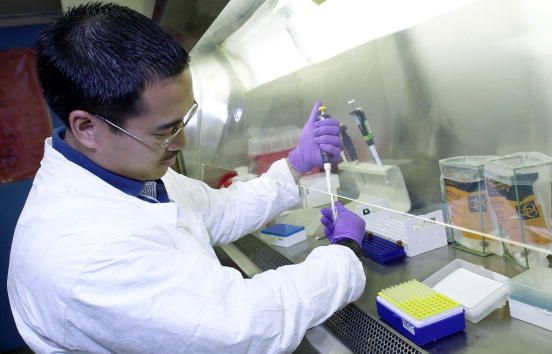 A military researcher inside of the lab.