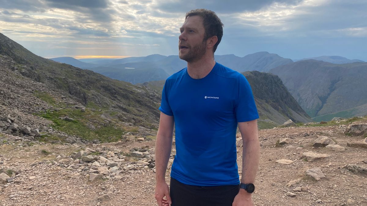 Alex running on Scafell