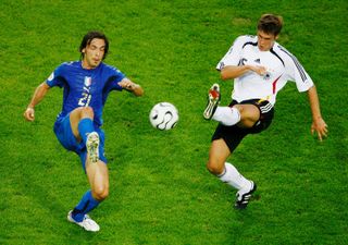 Italy's Andrea Pirlo battles for the ball with Germany's Sebastian Kehl in the teams' 2006 World Cup semi-final.